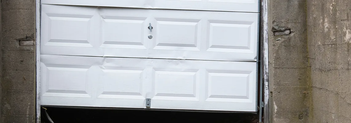 Garage Door Got Hit By A Car Dent Removal in Fort Pierce, FL